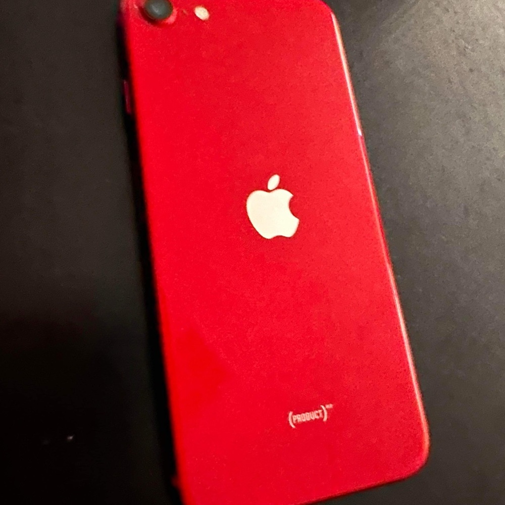 Almost new red iPhone SE. no cracks or scratches barely used it. T-Mobile